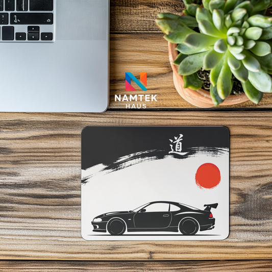 Japanese minimalist JDM car desk mat featuring black sports car and red sun ink design