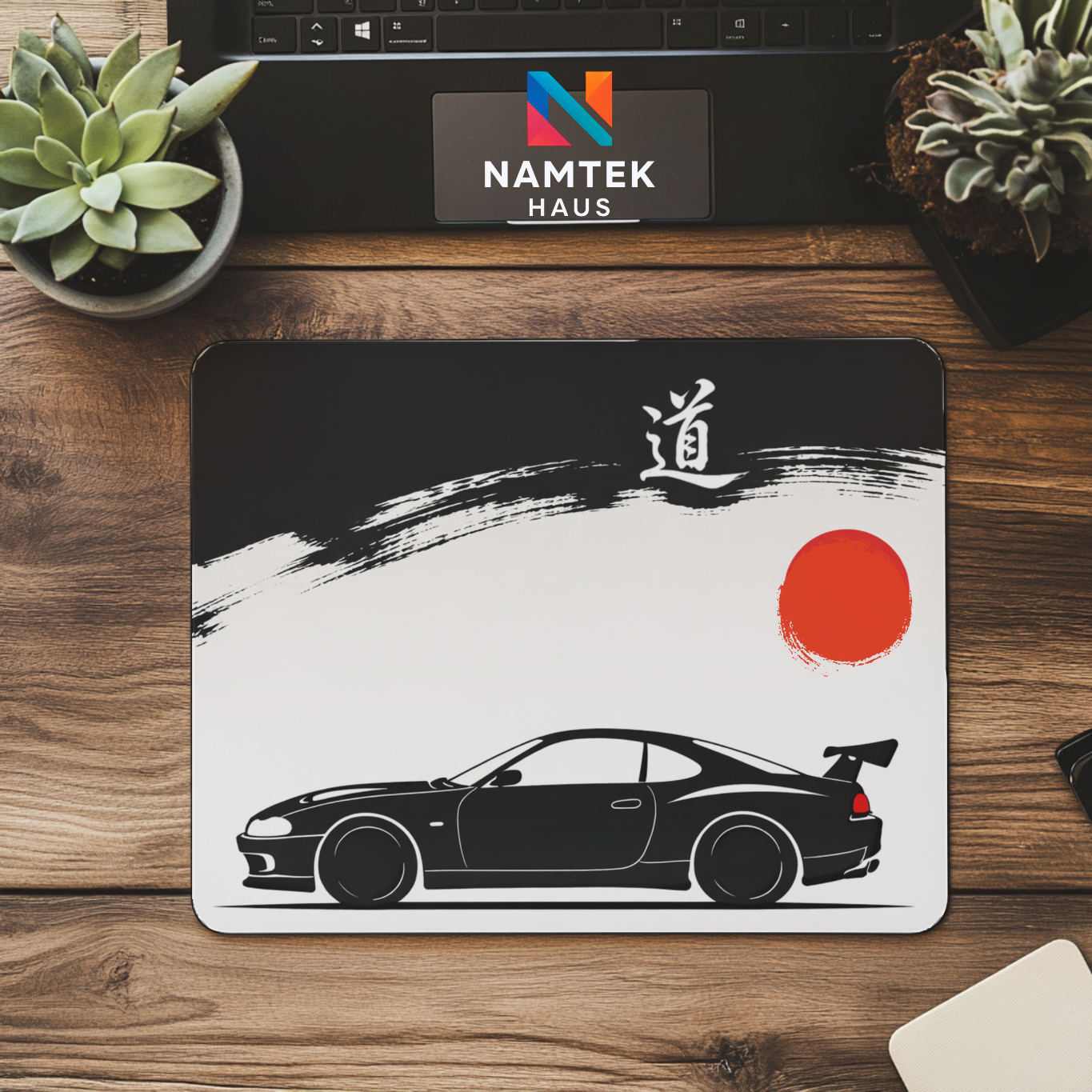 Japanese minimalist JDM car desk mat featuring black sports car and red sun ink design