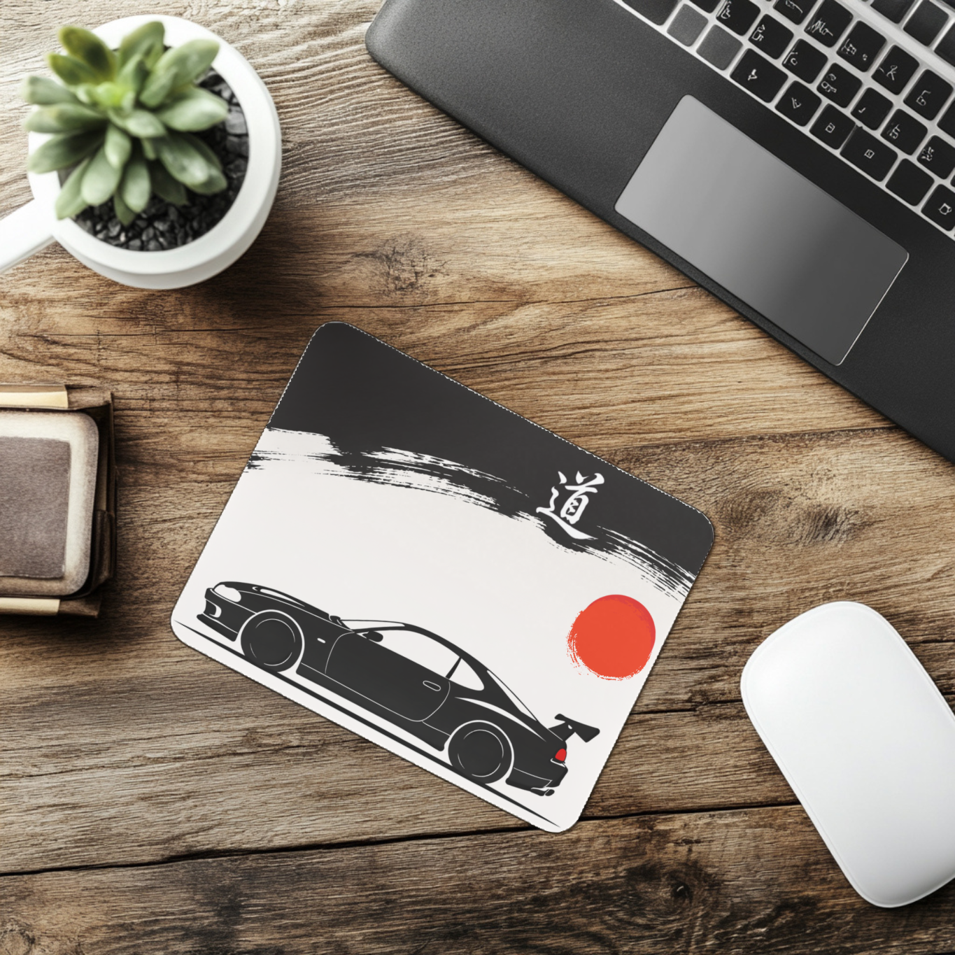 Japanese minimalist JDM car desk mat featuring black sports car and red sun ink design